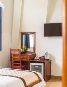 TV a/nebo společenská místnost v ubytování Dieu Thong Hotel
