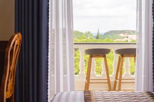 Balkón nebo terasa v ubytování Dieu Thong Hotel