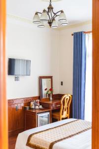 TV a/nebo společenská místnost v ubytování Dieu Thong Hotel