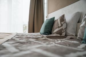 Postel nebo postele na pokoji v ubytování Haus Tourneur