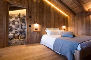 Voodi või voodid majutusasutuse Lavarets Chambres d’Hôtes toas