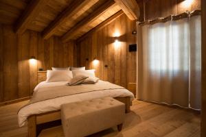 Voodi või voodid majutusasutuse Lavarets Chambres d’Hôtes toas
