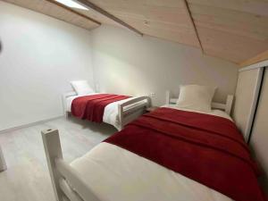 Ένα ή περισσότερα κρεβάτια σε δωμάτιο στο Gite un bren de bonheur