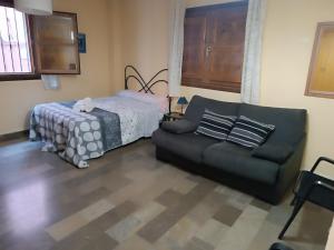 Posteľ alebo postele v izbe v ubytovaní Céntrico estudio en Granada