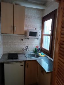 Kuchyňa alebo kuchynka v ubytovaní Céntrico estudio en Granada
