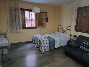 Posteľ alebo postele v izbe v ubytovaní Céntrico estudio en Granada