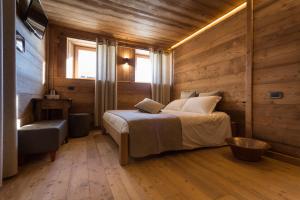 Voodi või voodid majutusasutuse Lavarets Chambres d’Hôtes toas