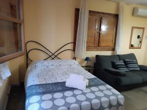 Posteľ alebo postele v izbe v ubytovaní Céntrico estudio en Granada