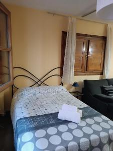 Posteľ alebo postele v izbe v ubytovaní Céntrico estudio en Granada