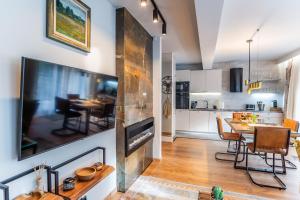Kuchyňa alebo kuchynka v ubytovaní Apartament 3 Strążyska 21A