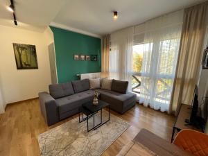 Zona d'estar a Apartman Lara - Divčigora