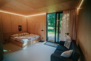 Postel nebo postele na pokoji v ubytování Apartmány Kurovický lom