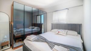 Säng eller sängar i ett rum på Nature View Flat with Balcony 7 min to Bargylia