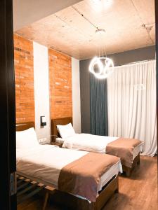 Rúm í herbergi á TM Apart Hotel