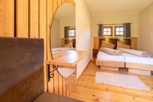 Postel nebo postele na pokoji v ubytování Lorettohof Hotel Garni