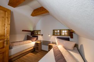 Postelja oz. postelje v sobi nastanitve Lorettohof Hotel Garni