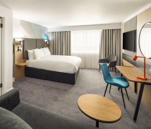 Voodi või voodid majutusasutuse Holiday Inn Aylesbury, an IHG Hotel toas