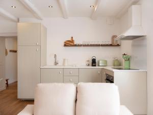 Η κουζίνα ή μικρή κουζίνα στο Le cosy de Keller - Nancy-Centre - Ideal pros