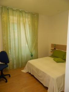 Ένα ή περισσότερα κρεβάτια σε δωμάτιο στο Bed & Breakfast Travellers