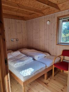 Postel nebo postele na pokoji v ubytování Rødvig Ferieby