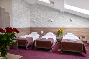 Posteľ alebo postele v izbe v ubytovaní Hotel Maximum
