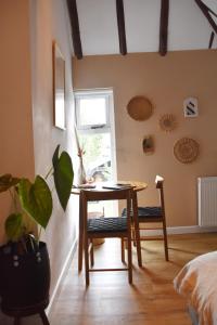 Bed en Breakfast Studio Raif - Authentiek en sfeervol overnachten的休息区