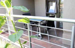 an office with a desk and a chair at Sedibeng Guest House in Vereeniging