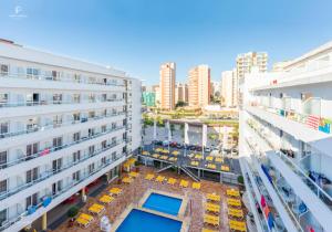 an aerial view of a building with a pool at Port Fiesta Park in Benidorm