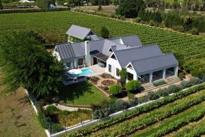an aerial view of a house in a vineyard at Fransvliet Guest House in Franschhoek