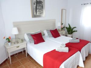 Postel nebo postele na pokoji v ubytování Villa Alto Arena piscina privada climatizada + 28 fotografií