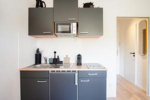 Кухня или мини-кухня в Homefy Boho Studio mit Parkplatz
