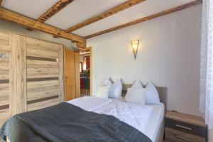 Postel nebo postele na pokoji v ubytování House Kaja