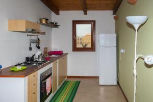 Kuchyň nebo kuchyňský kout v ubytování Aparthotel Ca Bonita