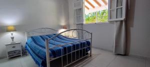 Postel nebo postele na pokoji v ubytování Villa piscine bord de mer 3 chambres