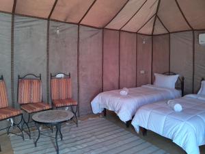 Krevet ili kreveti u jedinici u objektu SAND STAR LUXURY CAMP