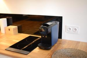 Kuchyňa alebo kuchynka v ubytovaní Le Flore - Appartement neuf - Cannes Center