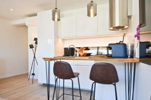 Kuchyňa alebo kuchynka v ubytovaní Le Flore - Appartement neuf - Cannes Center