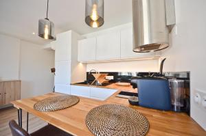 Kuchyňa alebo kuchynka v ubytovaní Le Flore - Appartement neuf - Cannes Center