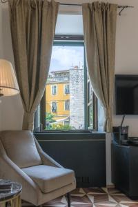 TV a/nebo společenská místnost v ubytování King Kresimir Heritage Hotel