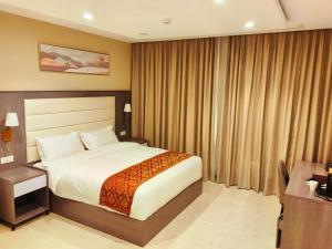 Krevet ili kreveti u jedinici u okviru objekta Wave View Hotel