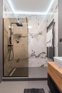 Koupelna v ubytování Fit Residence + 37 fotografií