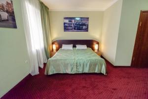 Letto o letti in una camera di Autopapa