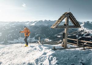 a man on skis on top of a snow covered mountain at GMS Holidays in Katschberghöhe