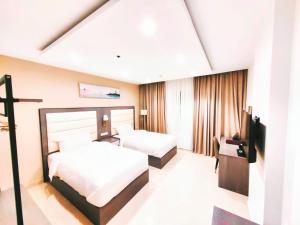 Krevet ili kreveti u jedinici u okviru objekta Wave View Hotel