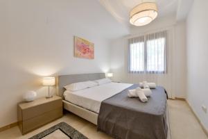 Giường trong phòng chung tại Apartment Harmony