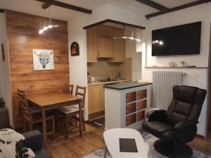 Kuchyň nebo kuchyňský kout v ubytování Petit paradis cocooning avec balcon à Torgon