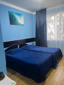 Letto o letti in una camera di Autopapa