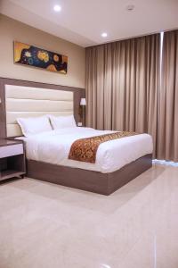 Krevet ili kreveti u jedinici u okviru objekta Wave View Hotel