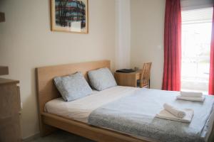 Postel nebo postele na pokoji v ubytování Dream Home Perea 70m2