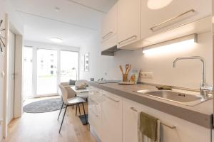 Kuchyň nebo kuchyňský kout v ubytování Smart Living Dornbirn
